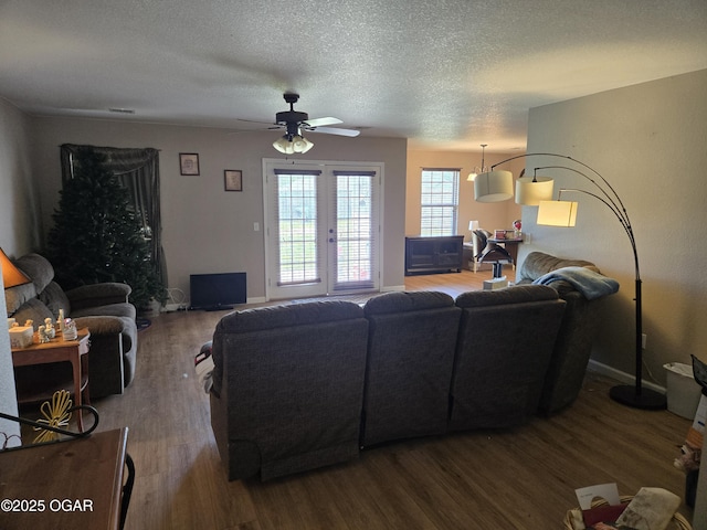 2798 Neosho Heights Ave, Neosho, MO 64850 - living room with ceiling fan, french doors, wood finished floors, and a textured ceiling