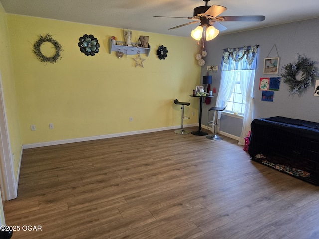 2798 Neosho Heights Ave, Neosho, MO 64850 - bedroom with baseboards and wood finished floors
