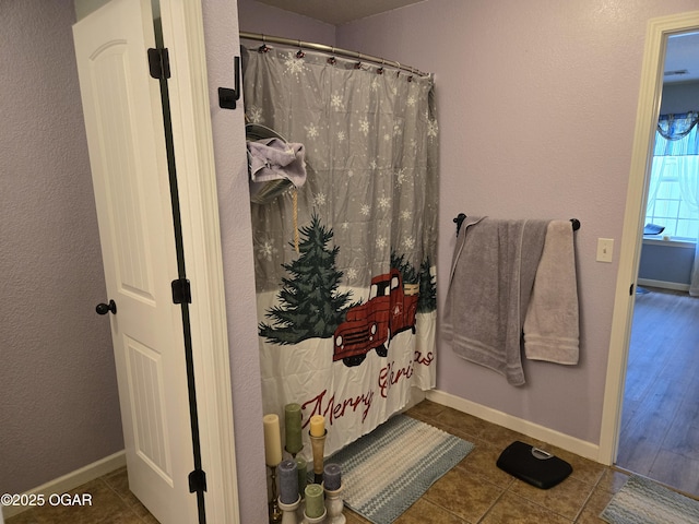 2798 Neosho Heights Ave, Neosho, MO 64850 - bathroom featuring baseboards, a shower with curtain, and tile patterned flooring