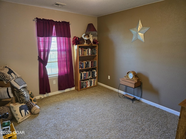 2798 Neosho Heights Ave, Neosho, MO 64850 - living area with visible vents, carpet flooring, and baseboards