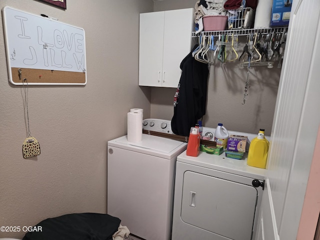 2798 Neosho Heights Ave, Neosho, MO 64850 - laundry area featuring cabinet space and washing machine and clothes dryer