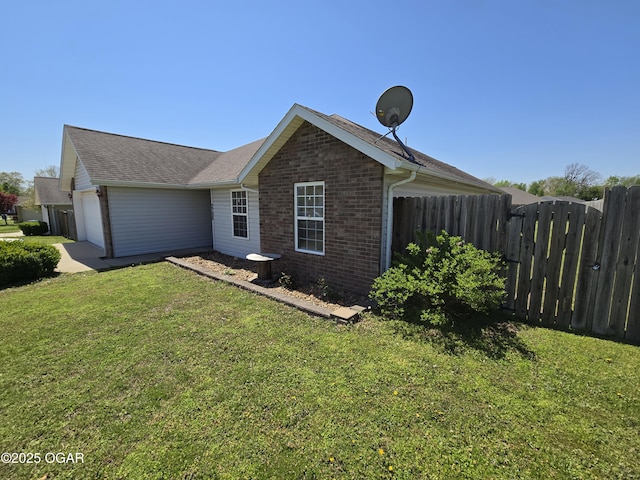 2798 Neosho Heights Ave, Neosho, MO 64850 - exterior space with fence, brick siding, a garage, a shingled roof, and a front yard