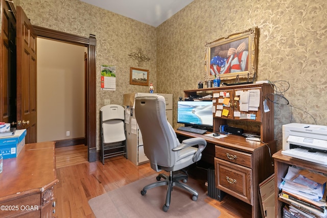 1529 S Grand Ave, Carthage, MO 64836 - home office with wallpapered walls and light wood finished floors