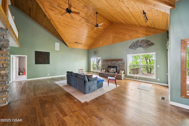24336 S Hilltop Dr, Afton, OK 74331 - living area with a fireplace, baseboards, high vaulted ceiling, wooden ceiling, and a ceiling fan