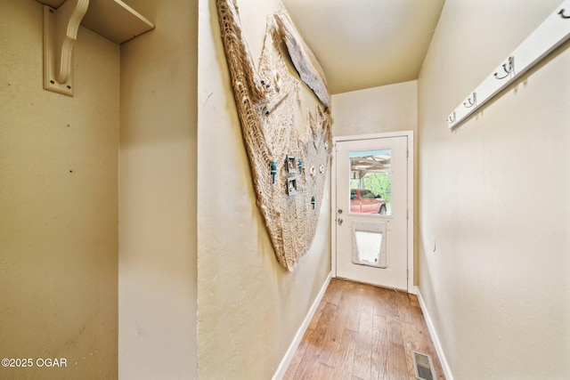 24336 S Hilltop Dr, Afton, OK 74331 - entryway featuring baseboards, visible vents, and light wood-style flooring