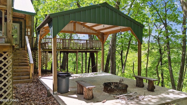 24336 S Hilltop Dr, Afton, OK 74331 - view of patio / terrace featuring a gazebo, a fire pit, a wooden deck, and stairway