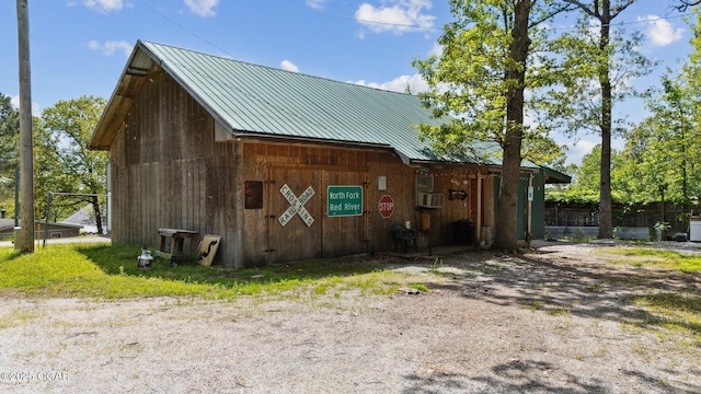 24336 S Hilltop Dr, Afton, OK 74331 - view of property exterior featuring a standing seam roof and metal roof
