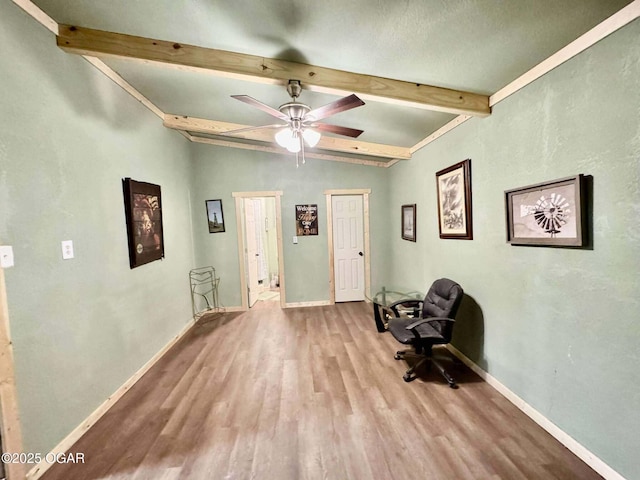 24336 S Hilltop Dr, Afton, OK 74331 - unfurnished room featuring baseboards, ceiling fan, vaulted ceiling with beams, and wood finished floors