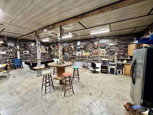 24336 S Hilltop Dr, Afton, OK 74331 - dining room with pool table and unfinished concrete flooring