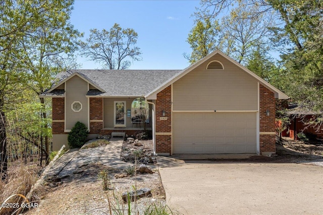 21425 Black Oak Dr, Garfield, AR 72732 - ranch-style home with brick siding, an attached garage, driveway, and a shingled roof