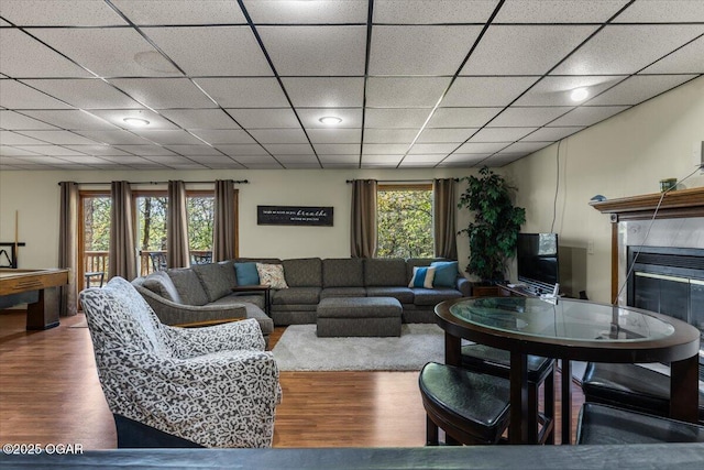 21425 Black Oak Dr, Garfield, AR 72732 - living room featuring wood finished floors, a premium fireplace, and a paneled ceiling