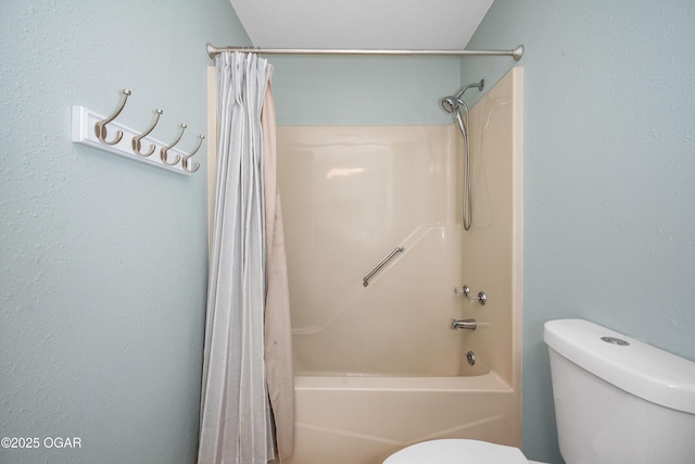 bathroom with toilet and shower / bath combination with curtain