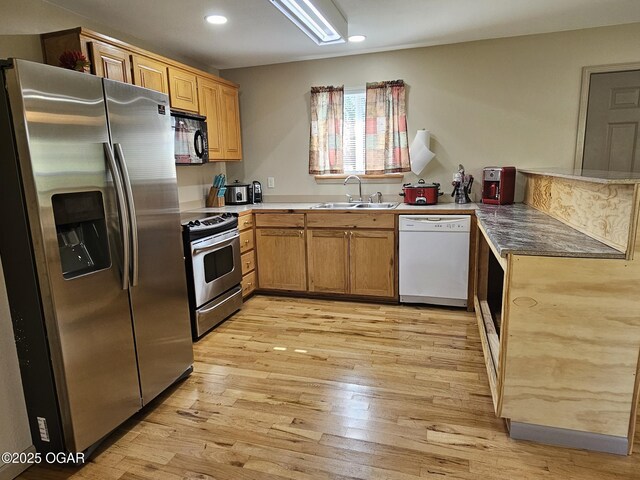4919 State Highway 76, Anderson, MO 64831 - kitchen with light wood-style floors, a sink, recessed lighting, and appliances with stainless steel finishes