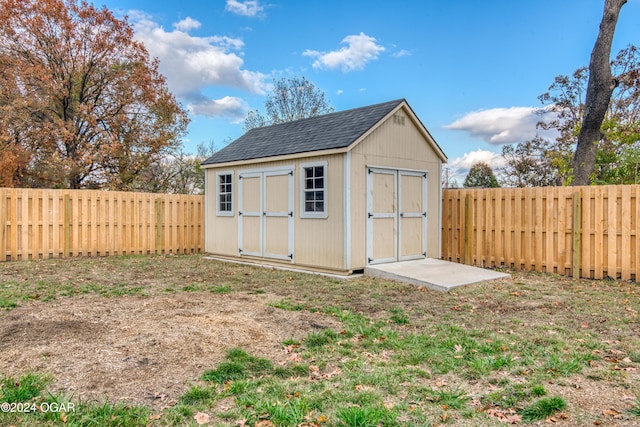 607 S Morgan Ct, Joplin, MO 64801 - view of shed with a fenced backyard