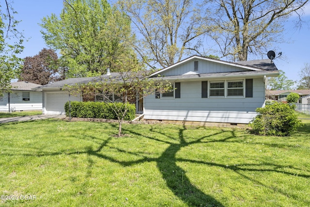 single story home with an attached garage, crawl space, driveway, and a front yard