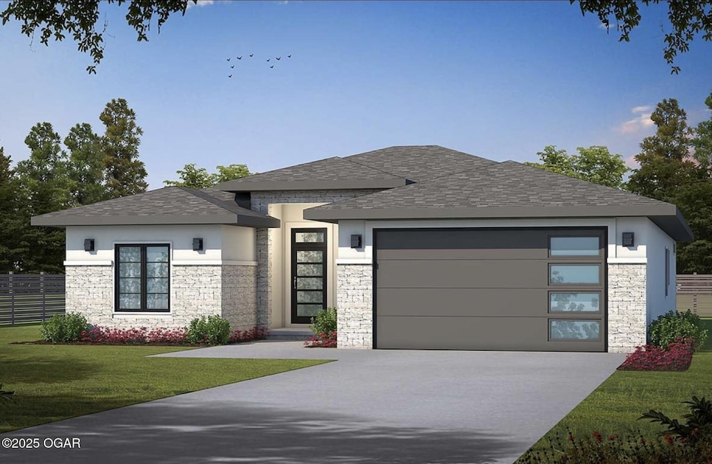 prairie-style home featuring a garage, a front lawn, fence, stone siding, and driveway