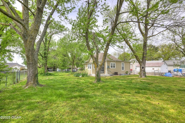 view of yard with fence