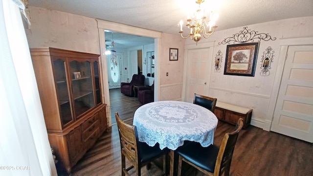 429 N Wall Ave, Joplin, MO 64801 - dining area with an inviting chandelier, a textured ceiling, and dark wood-type flooring
