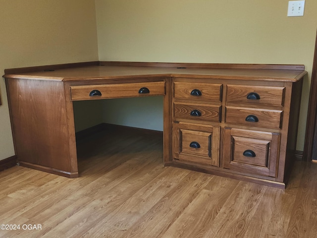 305 E Maple St, Liberal, MO 64762 - room details with wood finished floors and baseboards