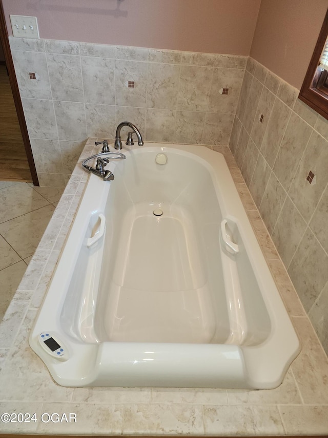 305 E Maple St, Liberal, MO 64762 - bathroom with a washtub