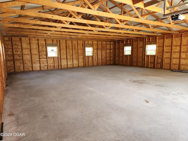 305 E Maple St, Liberal, MO 64762 - garage with a garage door opener