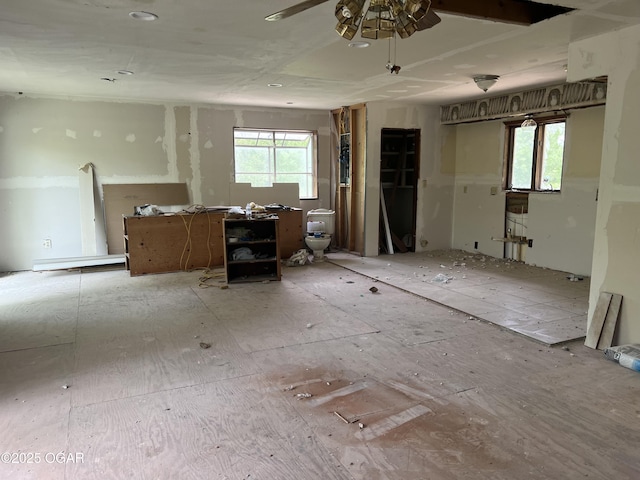 interior space with a ceiling fan