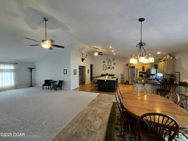 2921 E Matthews Dr, Joplin, MO 64801 - dining space featuring ceiling fan, vaulted ceiling, recessed lighting, and light wood-style flooring