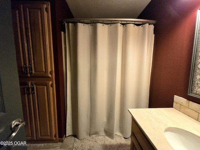 2921 E Matthews Dr, Joplin, MO 64801 - full bath featuring vanity, a textured ceiling, a textured wall, and a shower with curtain