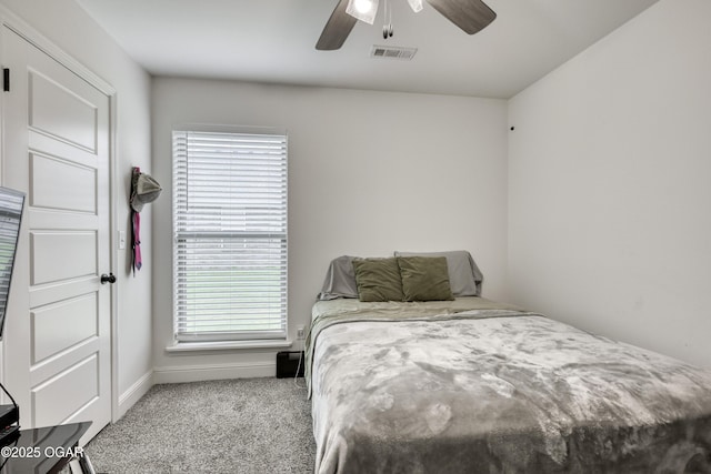 354 Sidney Ln, Webb City, MO 64870 - carpeted bedroom featuring baseboards, a ceiling fan, and visible vents