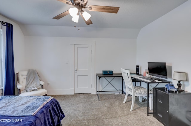 carpeted bedroom with baseboards, vaulted ceiling, and ceiling fan