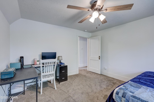 carpeted bedroom featuring baseboards and vaulted ceiling