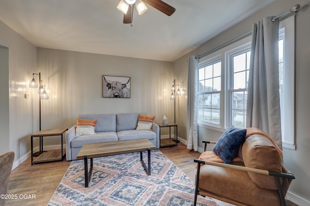 1713 Indiana Ave, Joplin, MO 64804 - living area with baseboards, light wood-style flooring, and ceiling fan