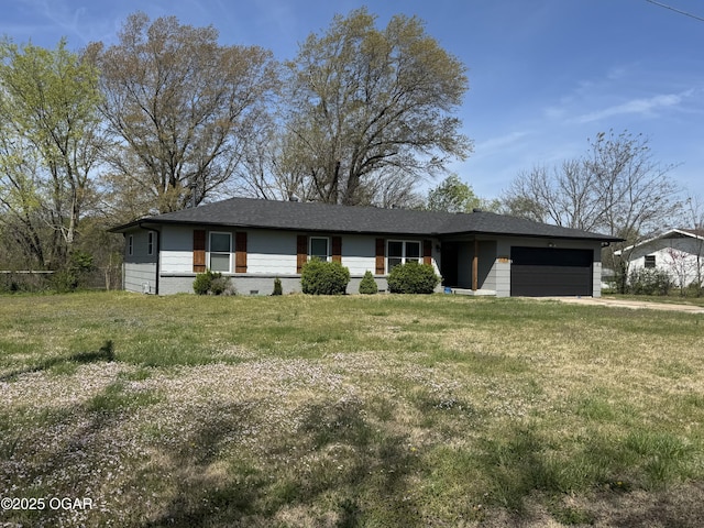 single story home with a front lawn and a garage