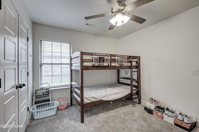 1810 Boyer Pl, Webb City, MO 64870 - bedroom featuring carpet, a closet, a ceiling fan, and baseboards