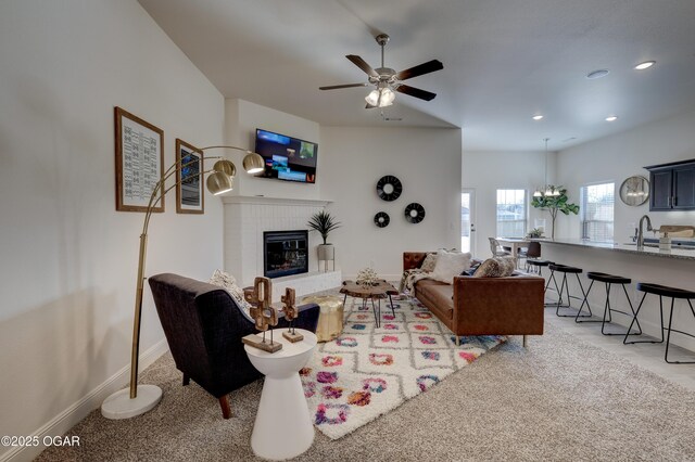 1814 Fountain Rd, Webb City, MO 64870 - living area with a ceiling fan, light colored carpet, a brick fireplace, baseboards, and recessed lighting