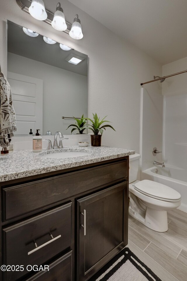 1814 Fountain Rd, Webb City, MO 64870 - full bath featuring vanity, toilet, and  shower combination