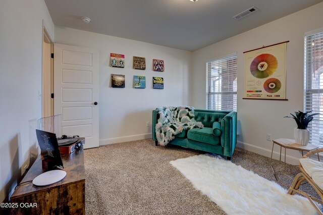 1814 Fountain Rd, Webb City, MO 64870 - sitting room with carpet floors, baseboards, visible vents, and a healthy amount of sunlight