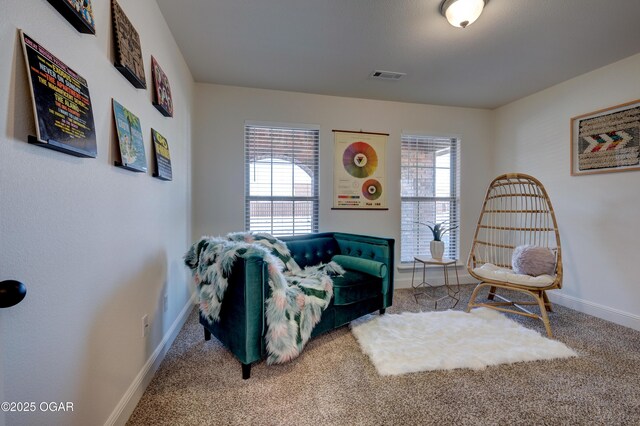1814 Fountain Rd, Webb City, MO 64870 - living area featuring baseboards, visible vents, and carpet