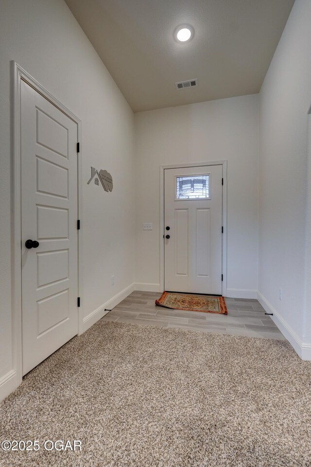 1814 Fountain Rd, Webb City, MO 64870 - carpeted entryway with baseboards and visible vents