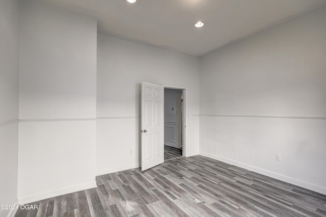 530 N Joplin Ave, Joplin, MO 64801 - empty room with baseboards, recessed lighting, and wood finished floors