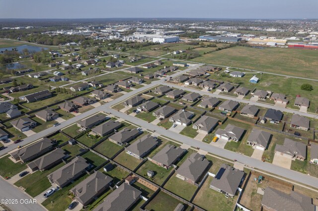 aerial overview of property's location featuring a large body of water