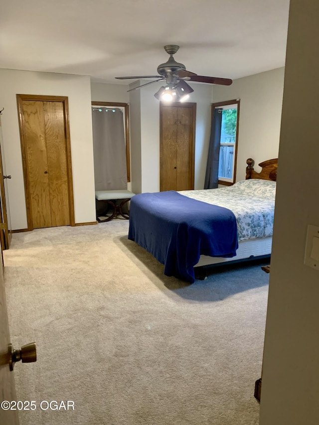 bedroom featuring ceiling fan and carpet flooring
