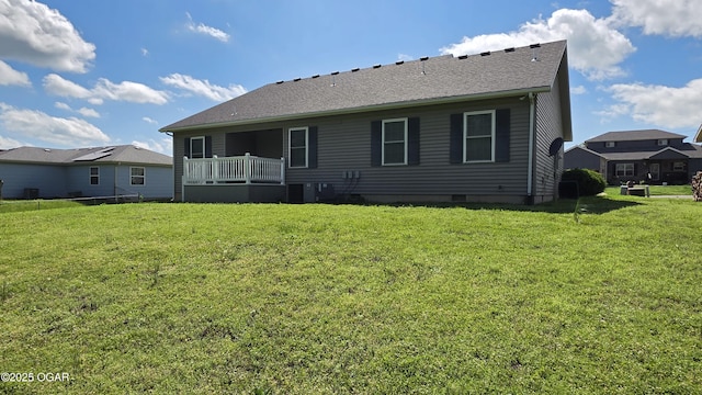 3031 S Monroe Ave, Joplin, MO 64804 - rear view of house featuring a yard
