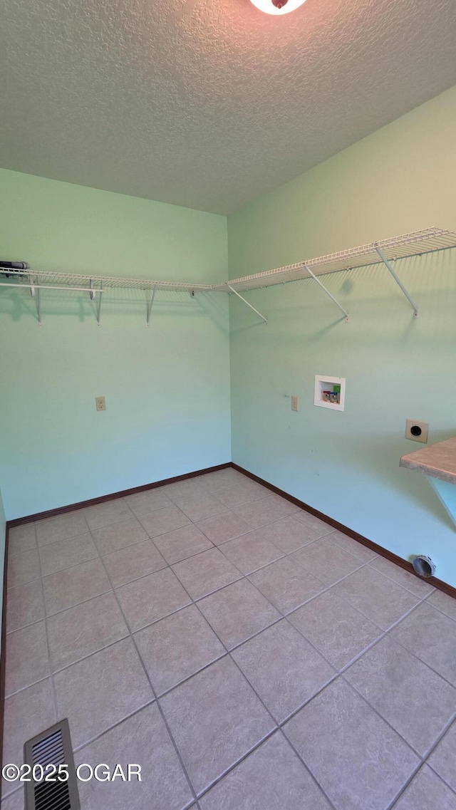 3031 S Monroe Ave, Joplin, MO 64804 - walk in closet with tile patterned flooring and visible vents