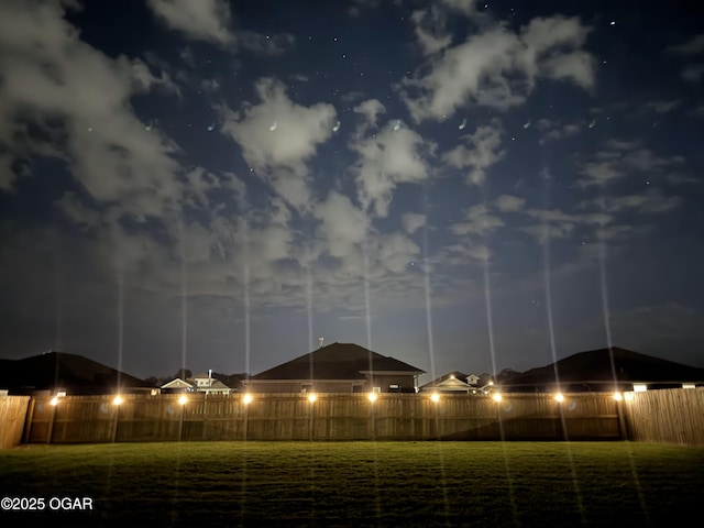 2006 Eagle Dr, Neosho, MO 64850 - yard at night with fence