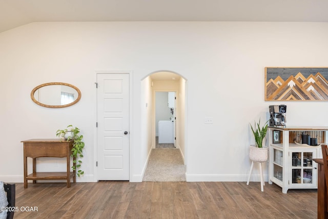 2006 Eagle Dr, Neosho, MO 64850 - corridor with arched walkways, wood finished floors, vaulted ceiling, and baseboards
