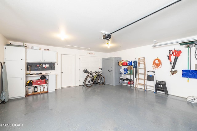2006 Eagle Dr, Neosho, MO 64850 - garage featuring a garage door opener