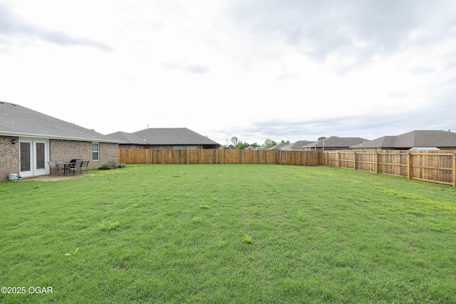2006 Eagle Dr, Neosho, MO 64850 - view of yard with french doors and a patio