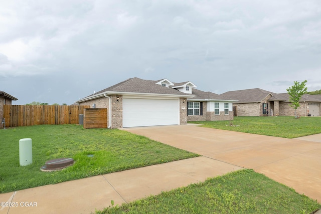 2006 Eagle Dr, Neosho, MO 64850 - view of front of house with brick siding, an attached garage, driveway, and roof with shingles