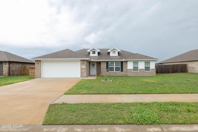 2006 Eagle Dr, Neosho, MO 64850 - view of front facade featuring a garage, concrete driveway, brick siding, and roof with shingles